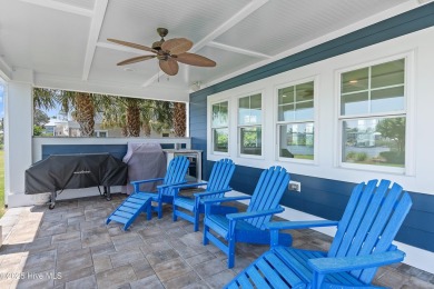 This modern luxury home offers a spectacular waterfront on Members Club At St. James Plantation in North Carolina - for sale on GolfHomes.com, golf home, golf lot