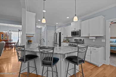 Welcome to 2312 Caracara Drive -- Where Comfort Meets Coastal on Harbour Point Golf Club in North Carolina - for sale on GolfHomes.com, golf home, golf lot