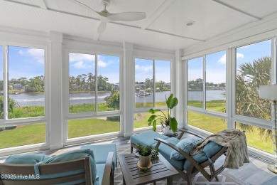 This modern luxury home offers a spectacular waterfront on Members Club At St. James Plantation in North Carolina - for sale on GolfHomes.com, golf home, golf lot