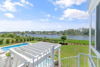 This modern luxury home offers a spectacular waterfront on Members Club At St. James Plantation in North Carolina - for sale on GolfHomes.com, golf home, golf lot