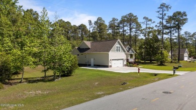Welcome to 2312 Caracara Drive -- Where Comfort Meets Coastal on Harbour Point Golf Club in North Carolina - for sale on GolfHomes.com, golf home, golf lot