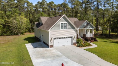 Welcome to 2312 Caracara Drive -- Where Comfort Meets Coastal on Harbour Point Golf Club in North Carolina - for sale on GolfHomes.com, golf home, golf lot