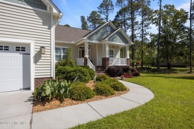 Welcome to 2312 Caracara Drive -- Where Comfort Meets Coastal on Harbour Point Golf Club in North Carolina - for sale on GolfHomes.com, golf home, golf lot
