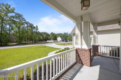 Welcome to 2312 Caracara Drive -- Where Comfort Meets Coastal on Harbour Point Golf Club in North Carolina - for sale on GolfHomes.com, golf home, golf lot