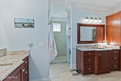 This modern luxury home offers a spectacular waterfront on Members Club At St. James Plantation in North Carolina - for sale on GolfHomes.com, golf home, golf lot