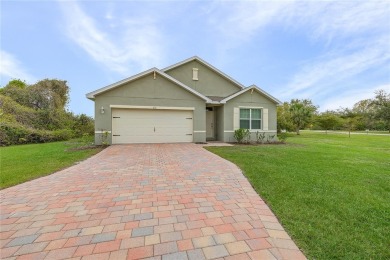 Welcome to this beautifully maintained 4-bedroom, 2-bathroom on Deep Creek Golf Club in Florida - for sale on GolfHomes.com, golf home, golf lot