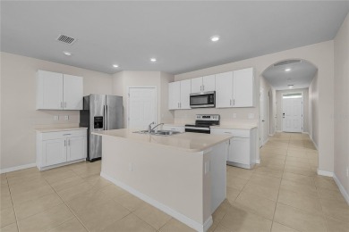 Welcome to this beautifully maintained 4-bedroom, 2-bathroom on Deep Creek Golf Club in Florida - for sale on GolfHomes.com, golf home, golf lot
