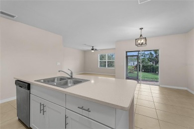 Welcome to this beautifully maintained 4-bedroom, 2-bathroom on Deep Creek Golf Club in Florida - for sale on GolfHomes.com, golf home, golf lot
