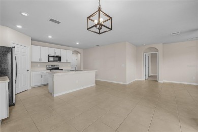 Welcome to this beautifully maintained 4-bedroom, 2-bathroom on Deep Creek Golf Club in Florida - for sale on GolfHomes.com, golf home, golf lot