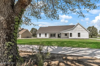 Welcome to easy, elegant living in this beautifully crafted new on Chowan Golf and Country Club in North Carolina - for sale on GolfHomes.com, golf home, golf lot