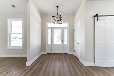 Welcome to easy, elegant living in this beautifully crafted new on Chowan Golf and Country Club in North Carolina - for sale on GolfHomes.com, golf home, golf lot