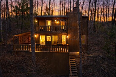 Tucked into a prime hillside setting within Hide-A-Way Hills on Hide-A-Way Hills Golf Club in Ohio - for sale on GolfHomes.com, golf home, golf lot