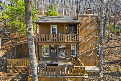 Tucked into a prime hillside setting within Hide-A-Way Hills on Hide-A-Way Hills Golf Club in Ohio - for sale on GolfHomes.com, golf home, golf lot