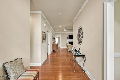 This home has it all! Curb appeal, low maintenance, attention to on Cape Fear National At Brunswick Forest in North Carolina - for sale on GolfHomes.com, golf home, golf lot