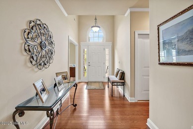 This home has it all! Curb appeal, low maintenance, attention to on Cape Fear National At Brunswick Forest in North Carolina - for sale on GolfHomes.com, golf home, golf lot