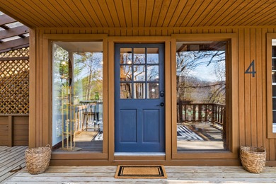 Tucked into a prime hillside setting within Hide-A-Way Hills on Hide-A-Way Hills Golf Club in Ohio - for sale on GolfHomes.com, golf home, golf lot