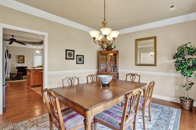 This home has it all! Curb appeal, low maintenance, attention to on Cape Fear National At Brunswick Forest in North Carolina - for sale on GolfHomes.com, golf home, golf lot