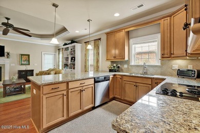 This home has it all! Curb appeal, low maintenance, attention to on Cape Fear National At Brunswick Forest in North Carolina - for sale on GolfHomes.com, golf home, golf lot