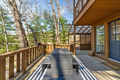 Tucked into a prime hillside setting within Hide-A-Way Hills on Hide-A-Way Hills Golf Club in Ohio - for sale on GolfHomes.com, golf home, golf lot