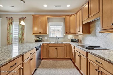 This home has it all! Curb appeal, low maintenance, attention to on Cape Fear National At Brunswick Forest in North Carolina - for sale on GolfHomes.com, golf home, golf lot