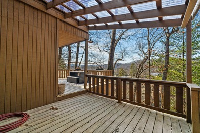 Tucked into a prime hillside setting within Hide-A-Way Hills on Hide-A-Way Hills Golf Club in Ohio - for sale on GolfHomes.com, golf home, golf lot