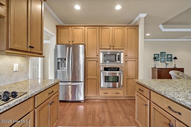 This home has it all! Curb appeal, low maintenance, attention to on Cape Fear National At Brunswick Forest in North Carolina - for sale on GolfHomes.com, golf home, golf lot