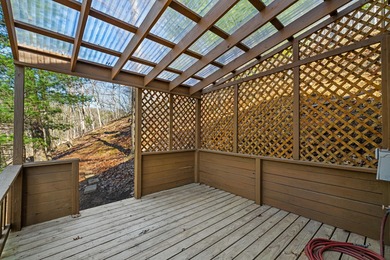 Tucked into a prime hillside setting within Hide-A-Way Hills on Hide-A-Way Hills Golf Club in Ohio - for sale on GolfHomes.com, golf home, golf lot