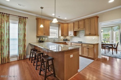 This home has it all! Curb appeal, low maintenance, attention to on Cape Fear National At Brunswick Forest in North Carolina - for sale on GolfHomes.com, golf home, golf lot