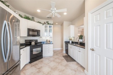 STUNNING TURNKEY FURNISHED LAKEFRONT & GOLF COURSE VIEW Condo in on Shadow Wood Country Club in Florida - for sale on GolfHomes.com, golf home, golf lot