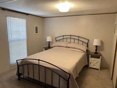 Located on a corner lot in Pine Point, this 2 bedroom, 1.5 bath on Tennessean Golf Club in Tennessee - for sale on GolfHomes.com, golf home, golf lot