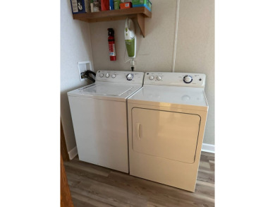 Located on a corner lot in Pine Point, this 2 bedroom, 1.5 bath on Tennessean Golf Club in Tennessee - for sale on GolfHomes.com, golf home, golf lot