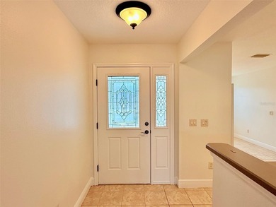 Buy this Wisteria Designer Home in this wonderful location on Truman Executive Golf Course in Florida - for sale on GolfHomes.com, golf home, golf lot