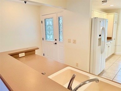 Buy this Wisteria Designer Home in this wonderful location on Truman Executive Golf Course in Florida - for sale on GolfHomes.com, golf home, golf lot