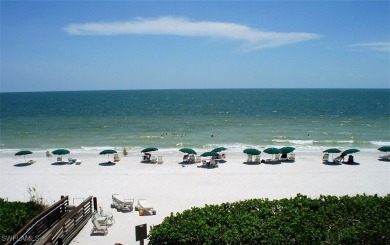 STUNNING TURNKEY FURNISHED LAKEFRONT & GOLF COURSE VIEW Condo in on Shadow Wood Country Club in Florida - for sale on GolfHomes.com, golf home, golf lot