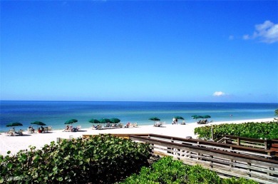 STUNNING TURNKEY FURNISHED LAKEFRONT & GOLF COURSE VIEW Condo in on Shadow Wood Country Club in Florida - for sale on GolfHomes.com, golf home, golf lot