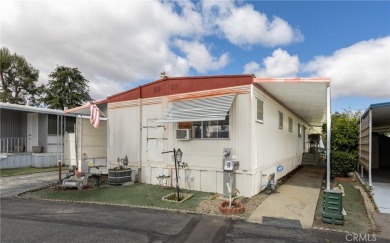 Great manufactured home sitting elevated up on the golf course on Arroyo Fairways Club and Golf Course in California - for sale on GolfHomes.com, golf home, golf lot