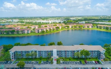 A beautiful lake view 2/2 unit on the top 4th floor located in on Flamingo Lakes Country Club in Florida - for sale on GolfHomes.com, golf home, golf lot