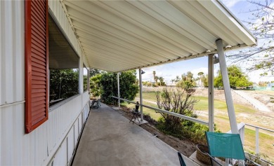 Great manufactured home sitting elevated up on the golf course on Arroyo Fairways Club and Golf Course in California - for sale on GolfHomes.com, golf home, golf lot