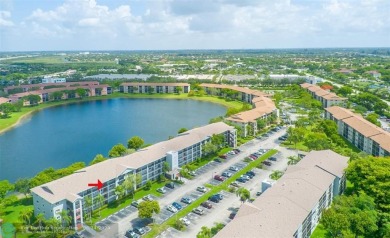 A beautiful lake view 2/2 unit on the top 4th floor located in on Flamingo Lakes Country Club in Florida - for sale on GolfHomes.com, golf home, golf lot