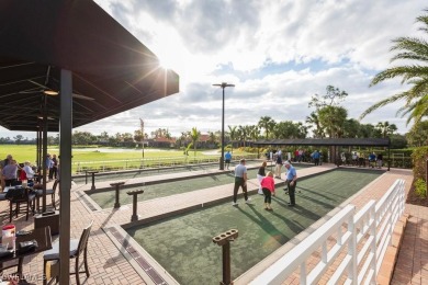 STUNNING TURNKEY FURNISHED LAKEFRONT & GOLF COURSE VIEW Condo in on Shadow Wood Country Club in Florida - for sale on GolfHomes.com, golf home, golf lot