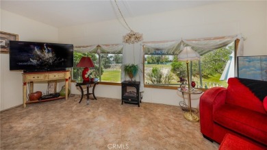 Great manufactured home sitting elevated up on the golf course on Arroyo Fairways Club and Golf Course in California - for sale on GolfHomes.com, golf home, golf lot