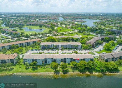 A beautiful lake view 2/2 unit on the top 4th floor located in on Flamingo Lakes Country Club in Florida - for sale on GolfHomes.com, golf home, golf lot
