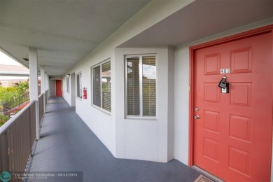 A beautiful lake view 2/2 unit on the top 4th floor located in on Flamingo Lakes Country Club in Florida - for sale on GolfHomes.com, golf home, golf lot