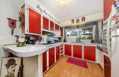 Great manufactured home sitting elevated up on the golf course on Arroyo Fairways Club and Golf Course in California - for sale on GolfHomes.com, golf home, golf lot