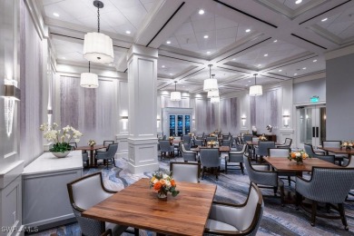 STUNNING TURNKEY FURNISHED LAKEFRONT & GOLF COURSE VIEW Condo in on Shadow Wood Country Club in Florida - for sale on GolfHomes.com, golf home, golf lot