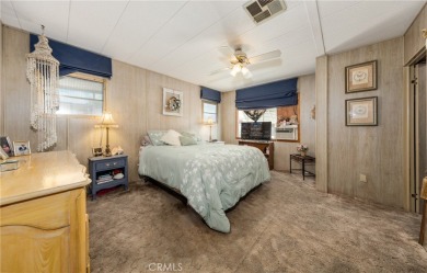 Great manufactured home sitting elevated up on the golf course on Arroyo Fairways Club and Golf Course in California - for sale on GolfHomes.com, golf home, golf lot