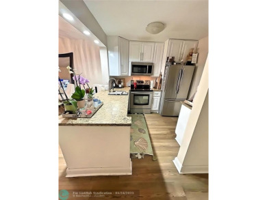 INCREDIBLE 2 Bed/2 Bath will plenty of UPGRADES including on Pine Island Ridge Country Club in Florida - for sale on GolfHomes.com, golf home, golf lot
