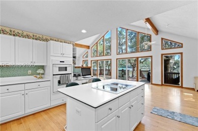 Breathtaking lake front views await you from nearly every room on The Golf Club at Pleasant Point Plantation in South Carolina - for sale on GolfHomes.com, golf home, golf lot