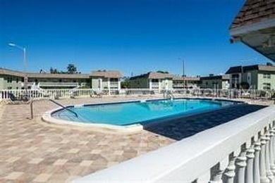 Wow! FURNISHED, 1st floor End. This desirable 55+ community  is on Tarpon Springs Golf Course in Florida - for sale on GolfHomes.com, golf home, golf lot