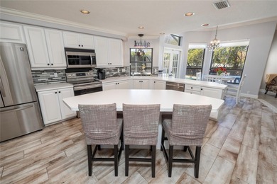 Welcome to your new home in the sought after gated community of on East Lake Woodlands Country Club in Florida - for sale on GolfHomes.com, golf home, golf lot